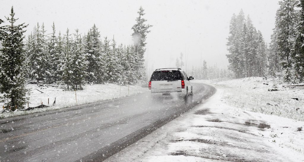 vehicle driving in the snow